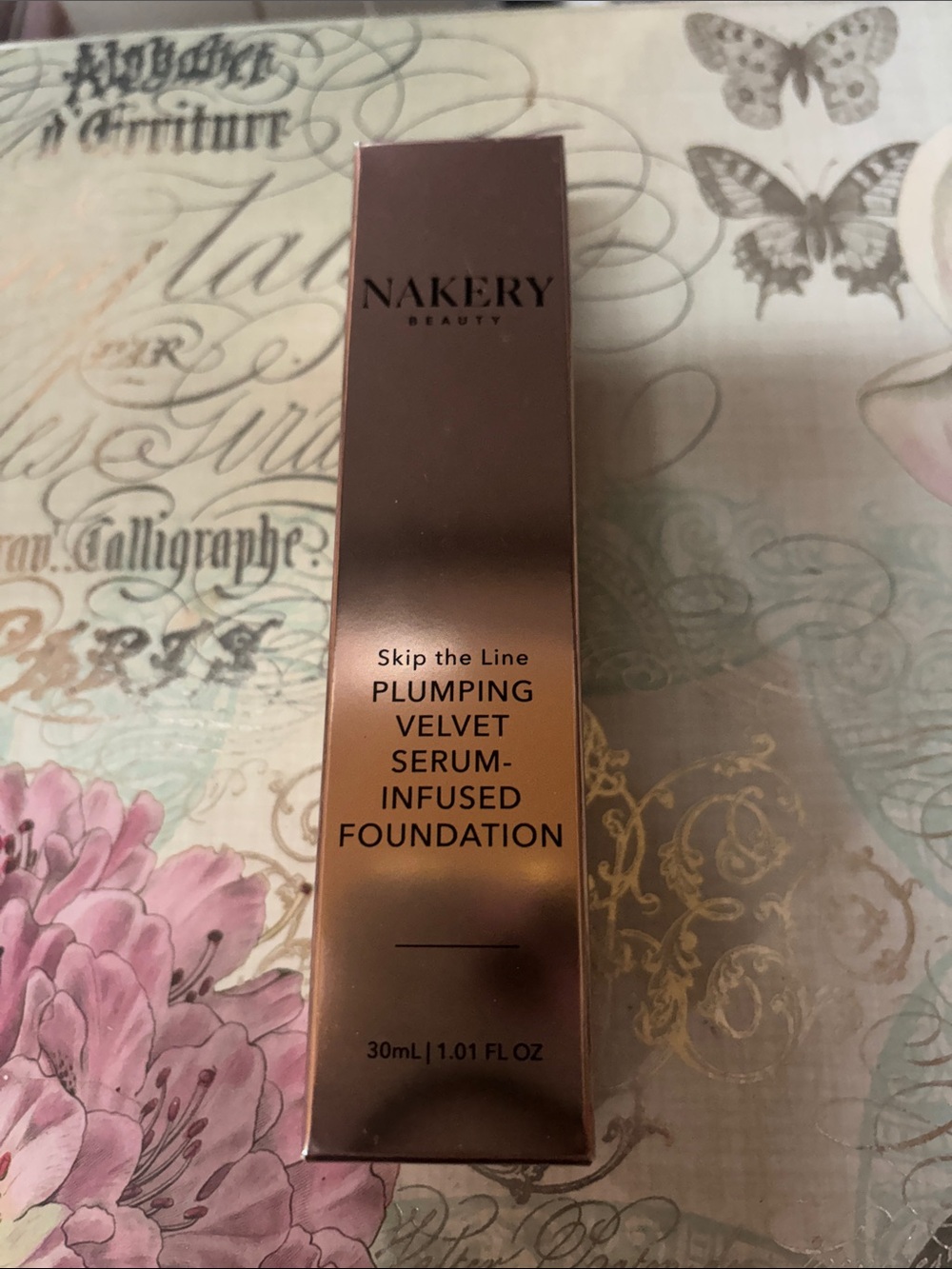 Nakery Beauty Plumping Velvet Serum-Infused Foundation — Rose Gold Packaging